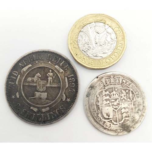 1392 - Two Silver Coins: 1817 George III Shilling and an 1894 South African 2 Shillings.