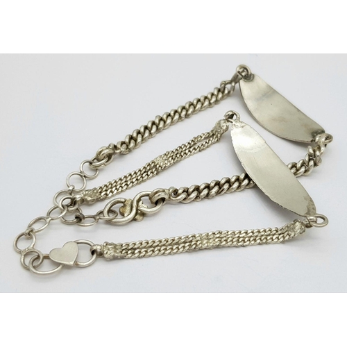 1396 - 2X vintage silver link ID bracelets. Total weight 14G. Total length 17cm and 18.5cm.