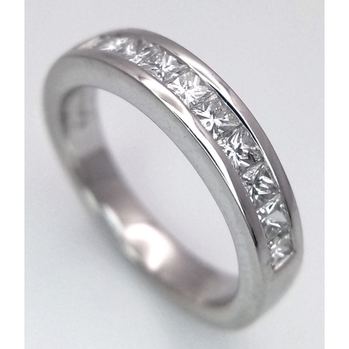 144 - A PLATINUM DIAMOND HALF ETERNITY RING - 0.60CTW. 5.6G. SIZE H. A/S1170