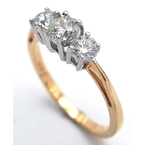 184 - AN 18K YELLOW GOLD DIAMOND TRILOGY RING - 0.60CTW. 2.6G. SIZE N. Ref: GW11