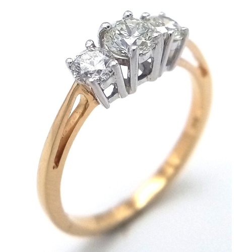 184 - AN 18K YELLOW GOLD DIAMOND TRILOGY RING - 0.60CTW. 2.6G. SIZE N. Ref: GW11