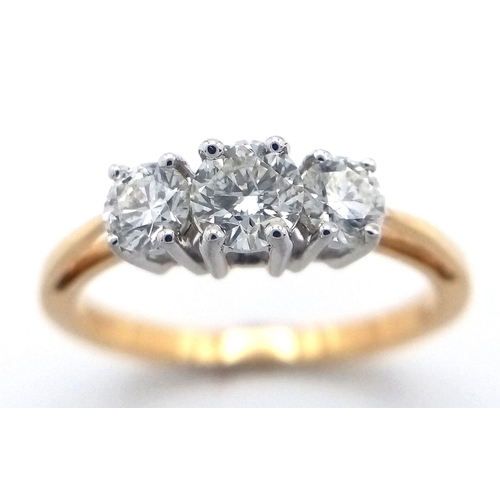 184 - AN 18K YELLOW GOLD DIAMOND TRILOGY RING - 0.60CTW. 2.6G. SIZE N. Ref: GW11