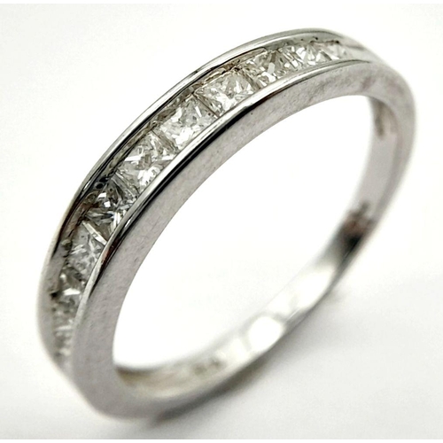 228 - AN 18K WHITE GOLD DIAMOND HALF ETERNITY RING - 0.50CTW. 3G. SIZE P. JR17.