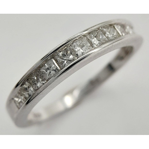 228 - AN 18K WHITE GOLD DIAMOND HALF ETERNITY RING - 0.50CTW. 3G. SIZE P. JR17.