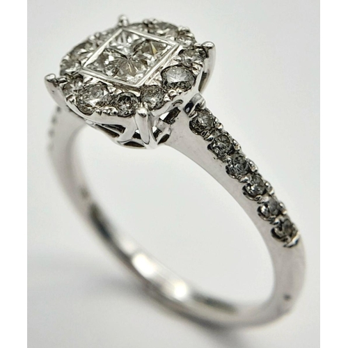 431 - A 9K WHITE GOLD DIAMOND RING - 0.55CTW. 3.1G. SIZE N. TAN6004.