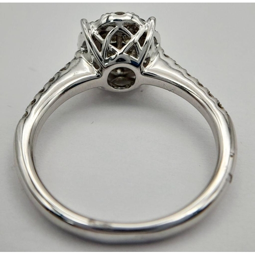 431 - A 9K WHITE GOLD DIAMOND RING - 0.55CTW. 3.1G. SIZE N. TAN6004.