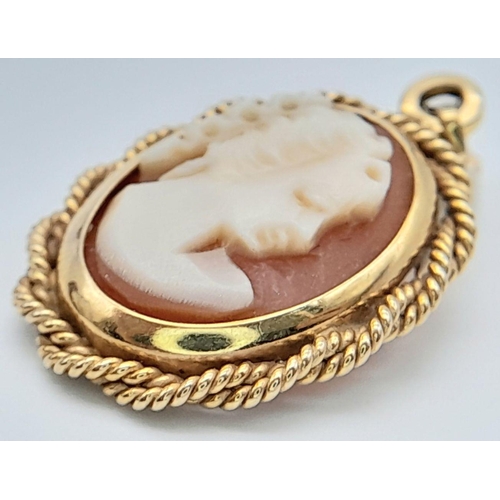 532 - Vintage ITALIAN CAMEO PENDANT. Set in Hallmarked 9 CARAT GOLD. Beautiful twisted GOLD ROPE surround.... 