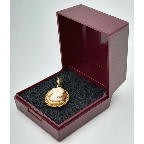 532 - Vintage ITALIAN CAMEO PENDANT. Set in Hallmarked 9 CARAT GOLD. Beautiful twisted GOLD ROPE surround.... 