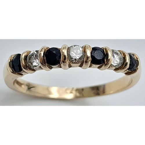 574 - Extremely pretty 9 CARAT GOLD RING set with SPINEL and ZIRCONIA GEMSTONES. Full UK hallmark. Complet... 