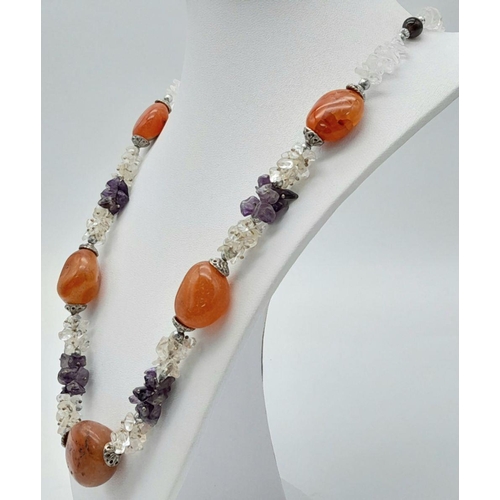 595 - An AMETHYST annd ORANGE CARNELIAN NECKLACE  with SILVER an and CRYSTAL QUARTZ DETAIL.  60 cm.