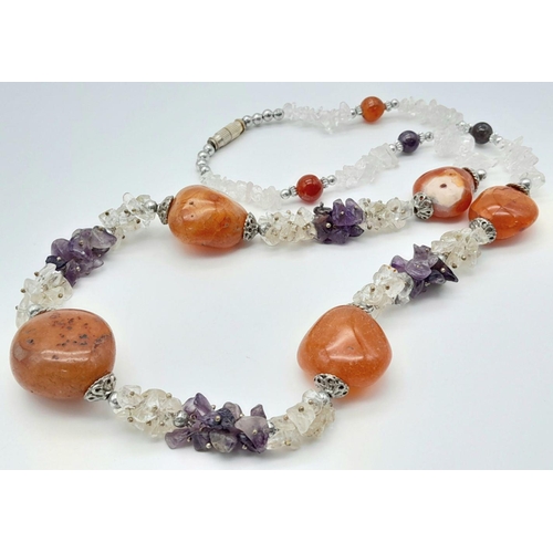 595 - An AMETHYST annd ORANGE CARNELIAN NECKLACE  with SILVER an and CRYSTAL QUARTZ DETAIL.  60 cm.