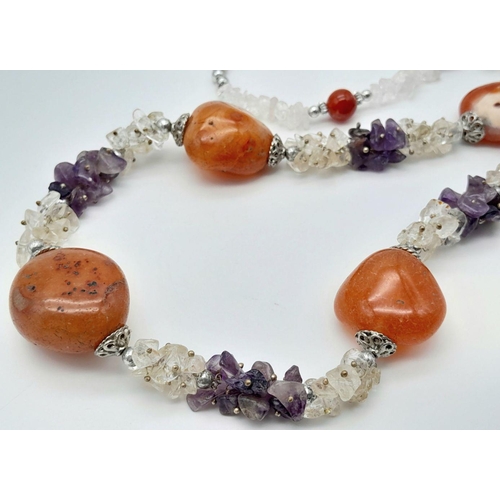 595 - An AMETHYST annd ORANGE CARNELIAN NECKLACE  with SILVER an and CRYSTAL QUARTZ DETAIL.  60 cm.