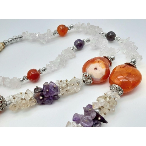 595 - An AMETHYST annd ORANGE CARNELIAN NECKLACE  with SILVER an and CRYSTAL QUARTZ DETAIL.  60 cm.