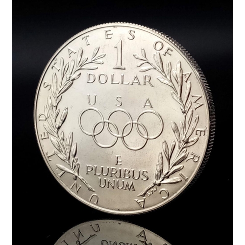 602 - A 1988 USA OLYMPIC SILVER DOLLAR. Condition brilliant and uncirculated. Minted for the SEOUL OLYMPIC... 