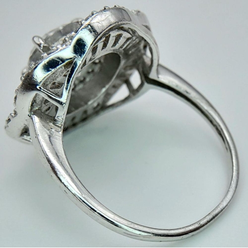 630 - Absolutely stunning SILVER and ZIRCONIA RING. Having a large (0.75 carat) SEARCHLIGHT SOLITAIRE moun... 