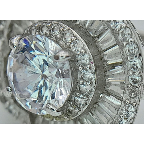 630 - Absolutely stunning SILVER and ZIRCONIA RING. Having a large (0.75 carat) SEARCHLIGHT SOLITAIRE moun... 