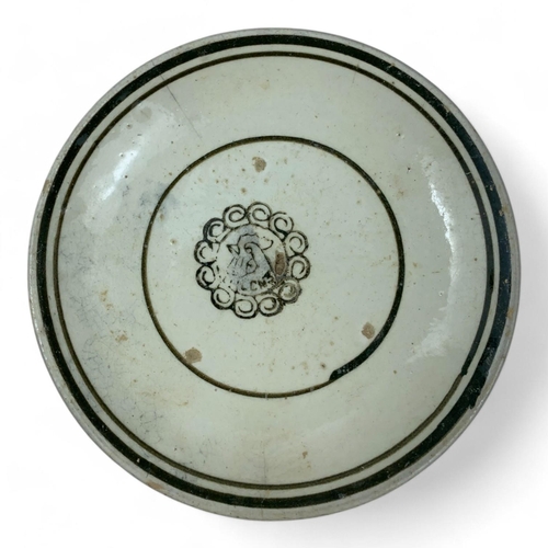 1341 - An antique set of Annam porcelain dishes with a circular motif. White and green glazed porcelain wit... 