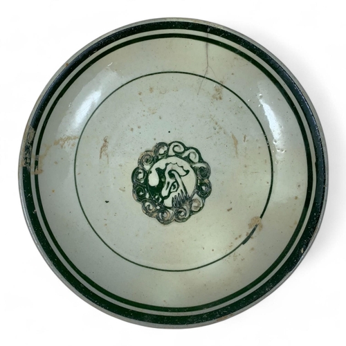 1341 - An antique set of Annam porcelain dishes with a circular motif. White and green glazed porcelain wit... 