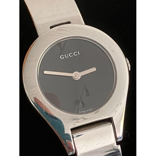 238 - Ladies Genuine vintage GUCCI 6700L WRISTWATCH. Black face model Finished in polished stainless steel... 