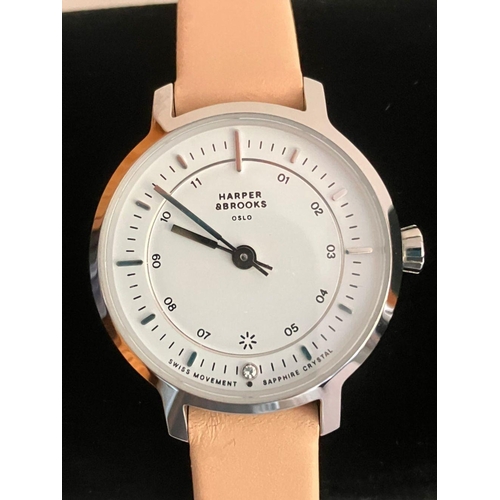 637 - Ladies HARPER BROOKS QUARTZ WRISTWATCH. Finished in stainless steel with cream leather strap. Comple... 