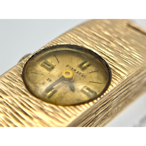 15 - A Vintage 9k Gold Accurist Ladies Watch. 9k gold bracelet and case - 10.5mm. Patinaed dial. 17 Jewel... 