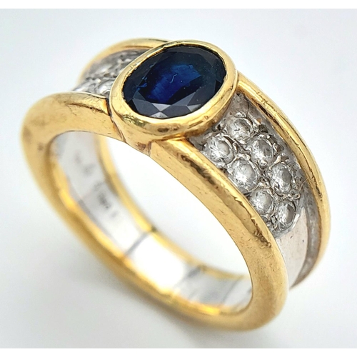 1869 - AN 18K YELLOW AND WHITE GOLD BAND RING WITH DIAMOND SHOULDERS AND ONYX CENTRE STONE .  11.2gms    si... 