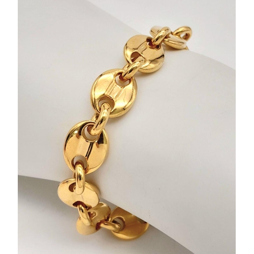 2000 - A GOLD PLATED SILVER COFFEE BEAN BRACELET .    42.8gms