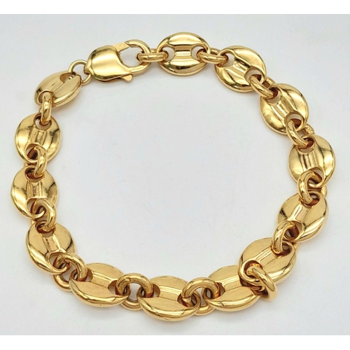 2000 - A GOLD PLATED SILVER COFFEE BEAN BRACELET .    42.8gms