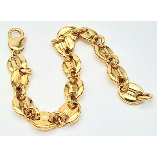 2000 - A GOLD PLATED SILVER COFFEE BEAN BRACELET .    42.8gms