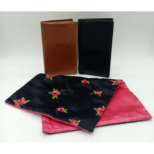 2019 - A collection of vintage designer leather wallets and a floral satin clutch.
One Whitehouse Cox, Brow... 