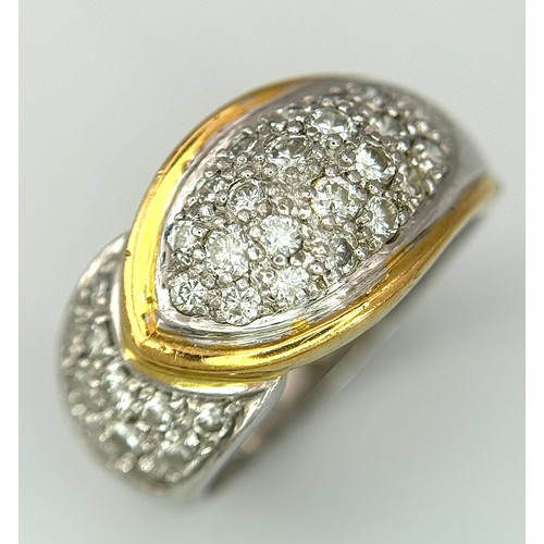 263 - A Gorgeous 18K Gold, Platinum Pave Diamond Ring. Overlap form with bright pave diamonds. Size L. 9.1... 