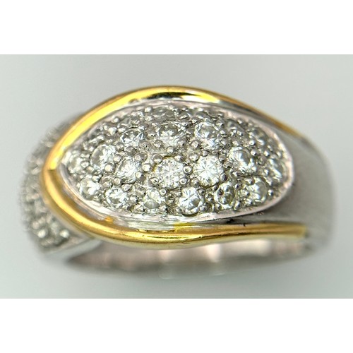 263 - A Gorgeous 18K Gold, Platinum Pave Diamond Ring. Overlap form with bright pave diamonds. Size L. 9.1... 