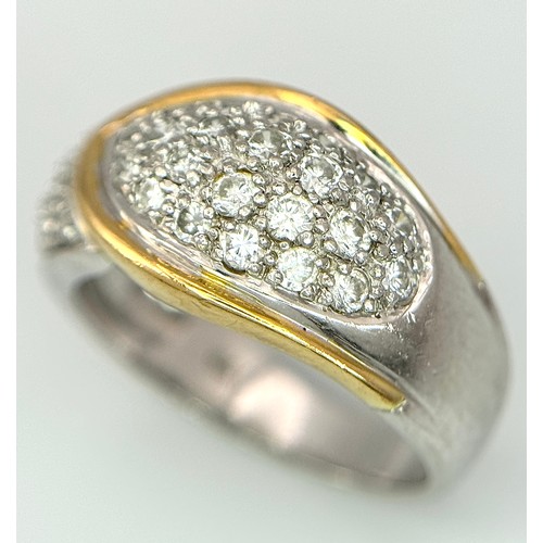 263 - A Gorgeous 18K Gold, Platinum Pave Diamond Ring. Overlap form with bright pave diamonds. Size L. 9.1... 