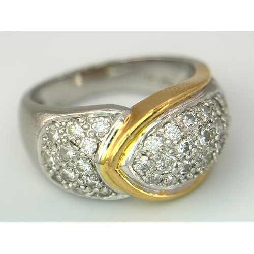 263 - A Gorgeous 18K Gold, Platinum Pave Diamond Ring. Overlap form with bright pave diamonds. Size L. 9.1... 