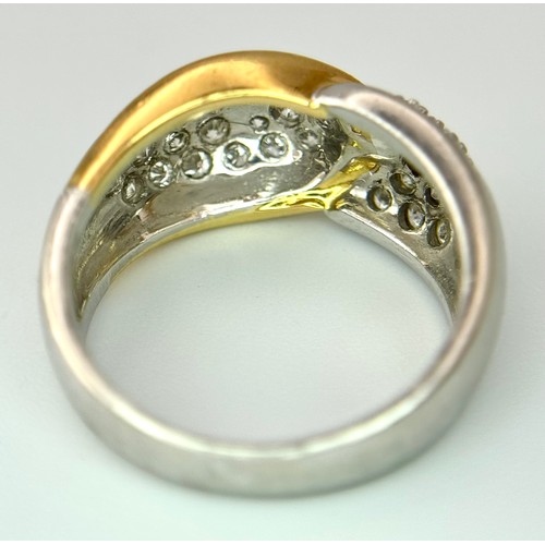 263 - A Gorgeous 18K Gold, Platinum Pave Diamond Ring. Overlap form with bright pave diamonds. Size L. 9.1... 