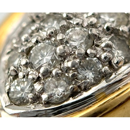 263 - A Gorgeous 18K Gold, Platinum Pave Diamond Ring. Overlap form with bright pave diamonds. Size L. 9.1... 