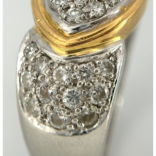 263 - A Gorgeous 18K Gold, Platinum Pave Diamond Ring. Overlap form with bright pave diamonds. Size L. 9.1... 