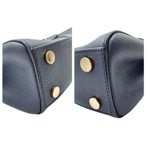 403 - An Aspinal of London Blue Lottie Letterbox Bag. Leather exterior with gold-toned hardware, chain and... 