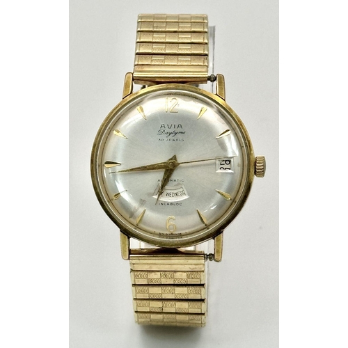 1074 - A Vintage Avia Daytyme Automatic Gents Watch. Expandable gilded bracelet. Case - 36mm. Silver tone d... 