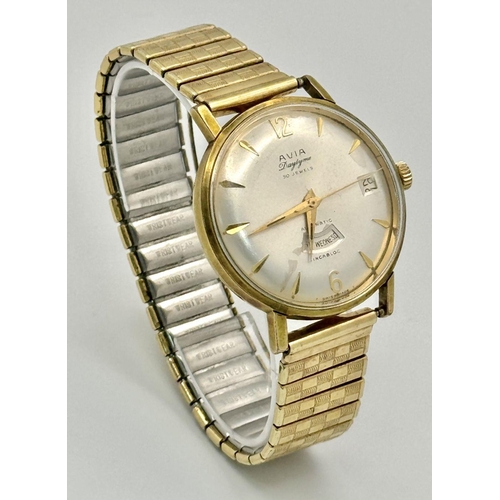 1074 - A Vintage Avia Daytyme Automatic Gents Watch. Expandable gilded bracelet. Case - 36mm. Silver tone d... 