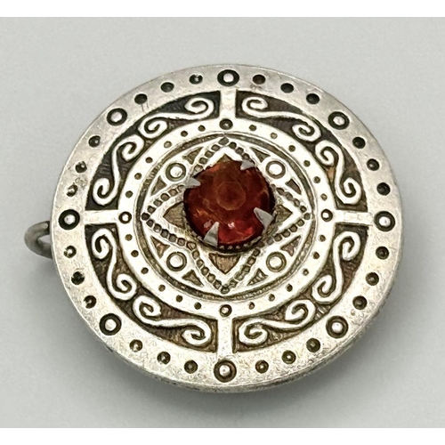 1542 - A Vintage Scottish Silver and Amber Stone Kilt Brooch. 2.5cm diameter.