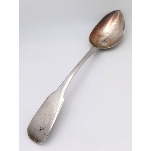 1573 - An antique Georgian sterling silver spoon. Full London hallmarks, 1821. Total weight 62G. Total leng... 