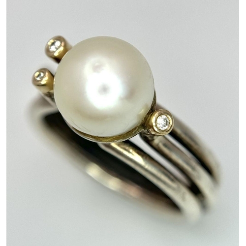 1636 - A fashion 925 silver Pearl centre and stone set ring. Total weight 7.9G. Size O.