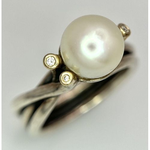 1636 - A fashion 925 silver Pearl centre and stone set ring. Total weight 7.9G. Size O.