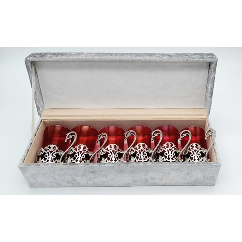 164 - Rarely seen in such condition a complete set of six antique small cranberry glasses with sterling si... 