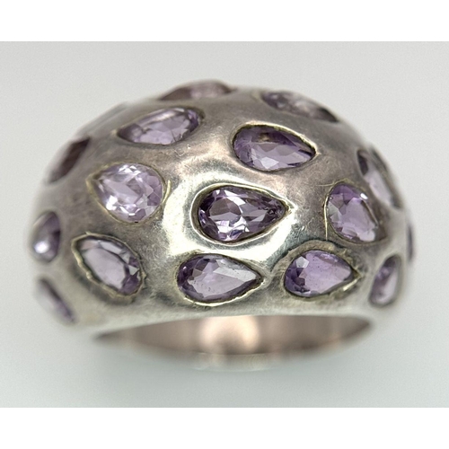 1650 - A fancy 925 silver Amethyst ring. Total weight 10.1G. Size P/Q.