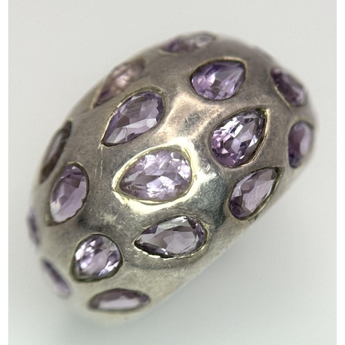 1650 - A fancy 925 silver Amethyst ring. Total weight 10.1G. Size P/Q.