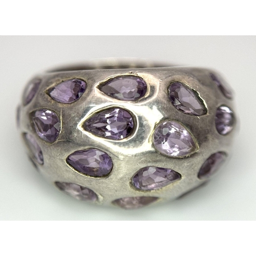 1650 - A fancy 925 silver Amethyst ring. Total weight 10.1G. Size P/Q.