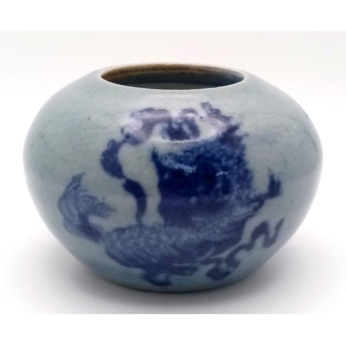 1668 - A Vintage Oriental Blue Glaze Bulbous Vase. Comes in original wooden box. 5cm tall.