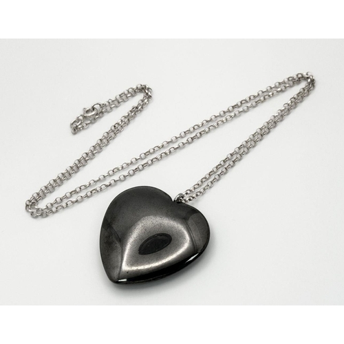 1818 - A Hematite large Heart pendant on 925 silver belcher chain. Total weight 23.9G. Total length 52cm.